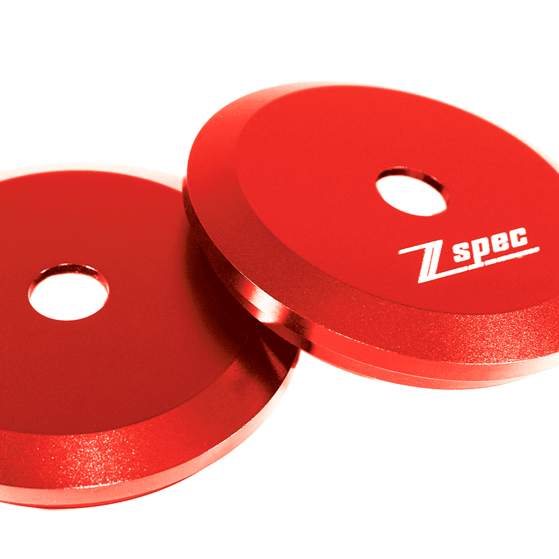 Load image into Gallery viewer, Red ZSPEC billet shock tower covers for '90-96 Nissan 300ZX (Z32) with white branding.