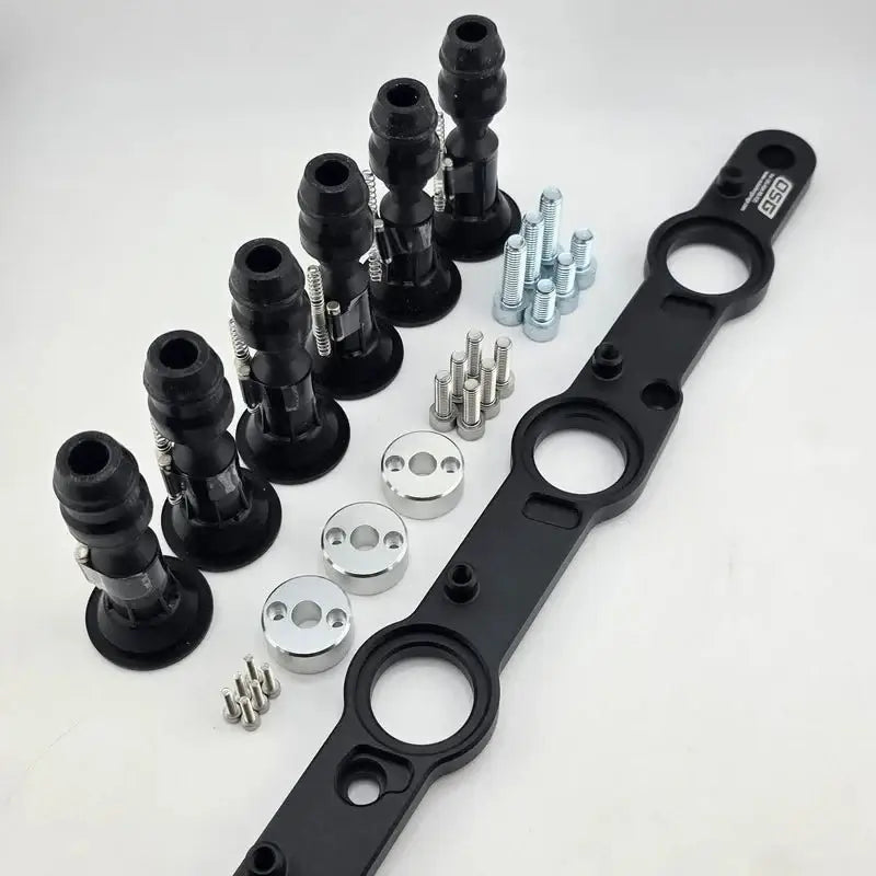 Load image into Gallery viewer, R35 ignition coil conversion kit for Nissan RB engines. Includes black coils, bracket, and mounting hardware.