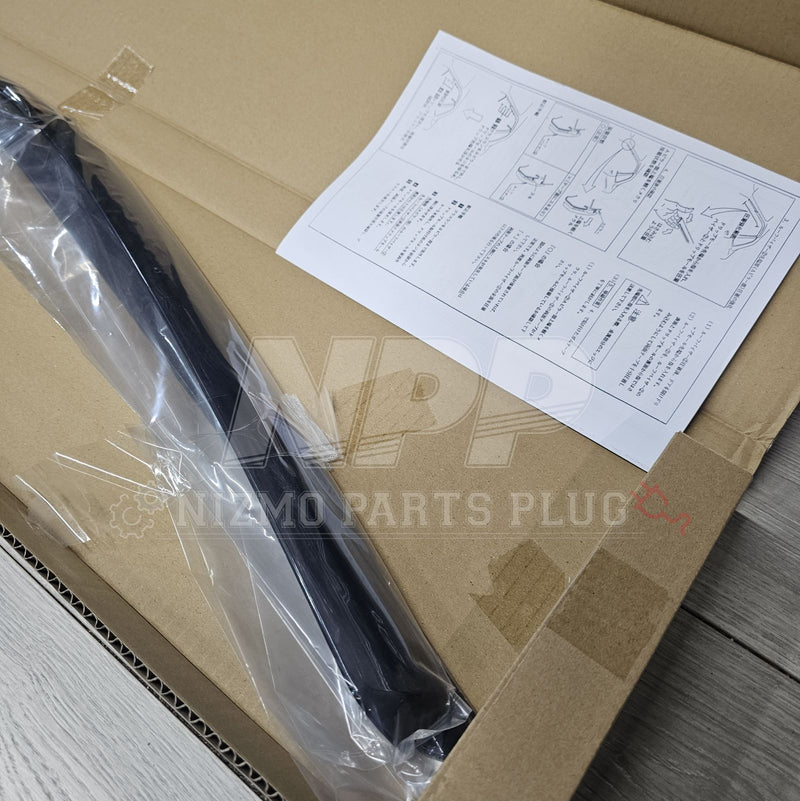 Load image into Gallery viewer, Black Nissan R34 Skyline Coupe optional JDM rainguard set in original plastic packaging with installation instructions.