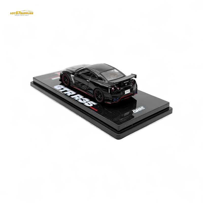 Load image into Gallery viewer, Inno64 1:64 scale black Nissan GT-R R35 NISMO diecast model on a display stand.