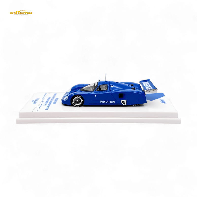 Load image into Gallery viewer, Inno64 1:64 scale blue Nissan R89C diecast race car model on a white display stand, side view, new condition.