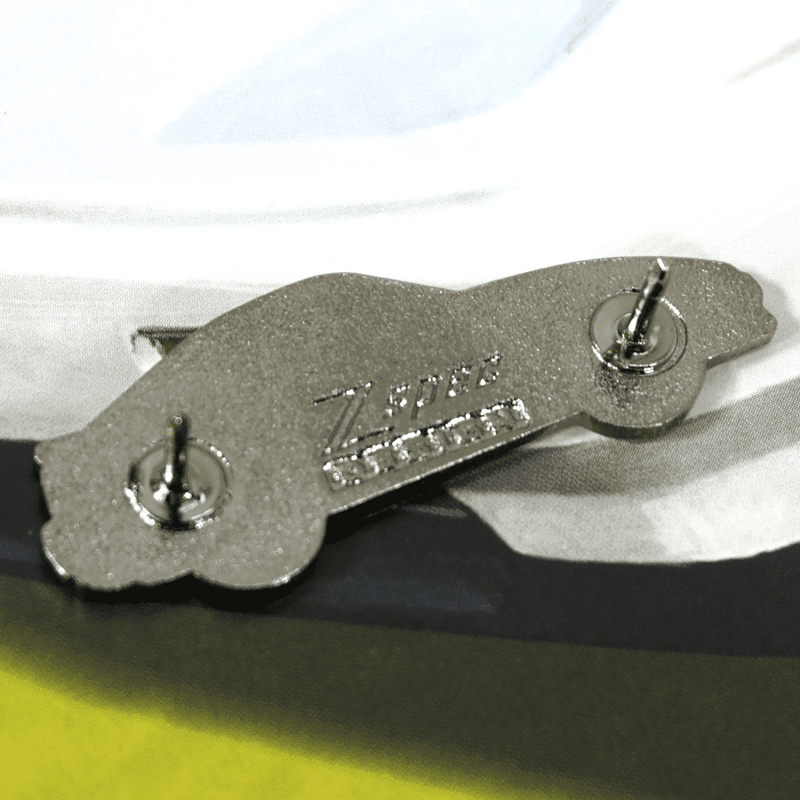 Load image into Gallery viewer, Silver ZSPEC Nissan 300zx Z31 Shiro Tribute lapel pin, shown from the back with two butterfly clutch pin backs.