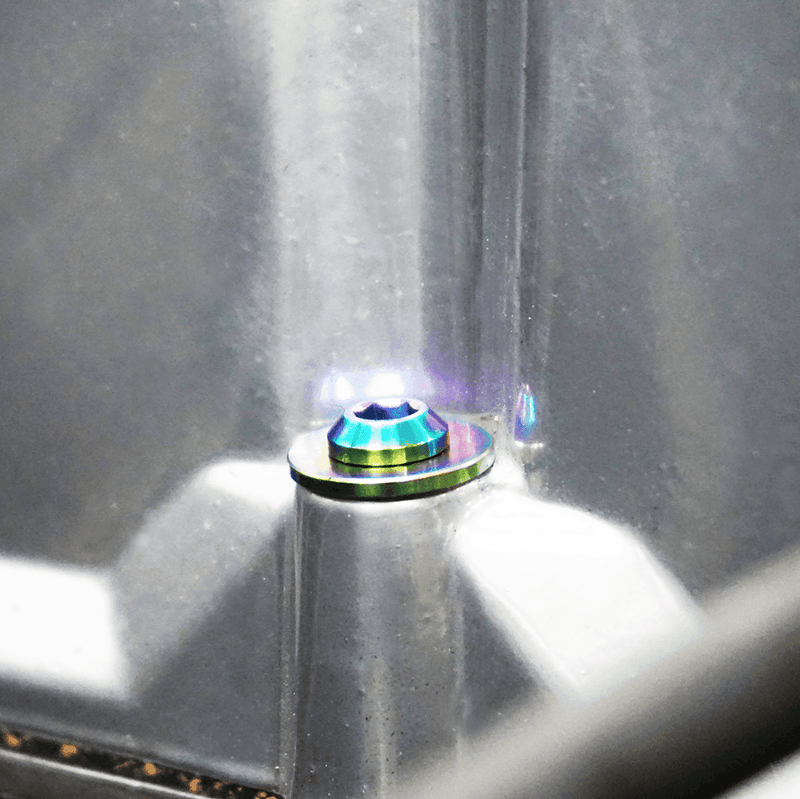 Load image into Gallery viewer, Titanium ZSPEC fastener bolt for '70-78 Datsun 240z/260z/280z with iridescent, multi-colored finish.