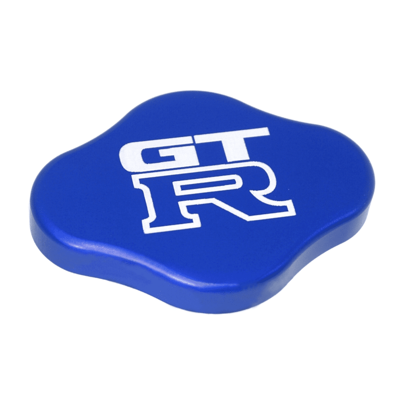 Load image into Gallery viewer, Blue billet radiator cap cover with white GT-R logo for Nissan R32-R35, isolated on white.