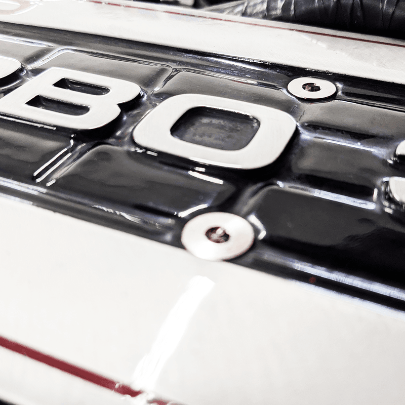 Load image into Gallery viewer, ZSPEC Grade-5 titanium engine cover fasteners installed on an '84-89 Nissan 300ZX Z31 engine cover.