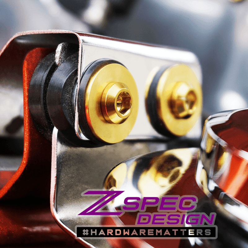 Load image into Gallery viewer, ZSPEC titanium power steering reservoir fasteners for Nissan 300ZX Z32 with polished gold finish and rubber bushings.