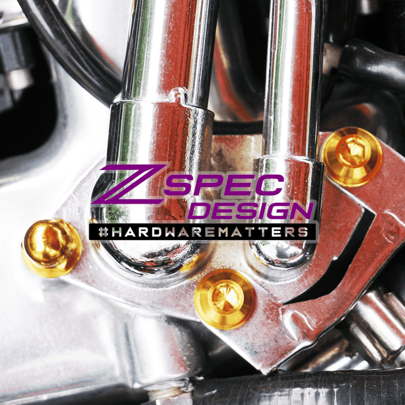 Load image into Gallery viewer, Gold titanium ZSPEC balance tube fastener kit installed on a Nissan 300ZX Z32 engine.