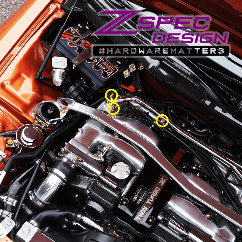 Load image into Gallery viewer, ZSPEC titanium balance tube fastener kit installed on a Nissan 300ZX Z32 engine bay with gold-tone hardware.