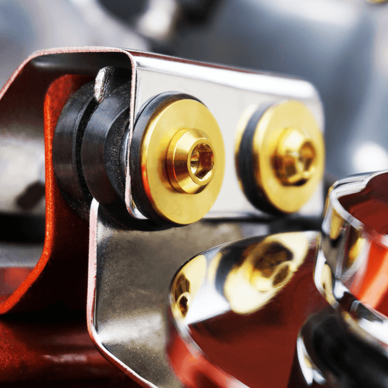 Load image into Gallery viewer, Gold ZSPEC titanium power steering reservoir fasteners for Nissan 300zx Z32. High-quality finish, new condition.