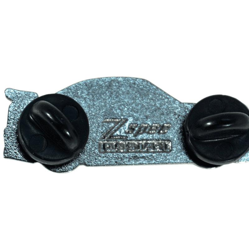 Load image into Gallery viewer, Back view of a silver ZSPEC Nissan Skyline R34 lapel pin featuring two black rubber fasteners.