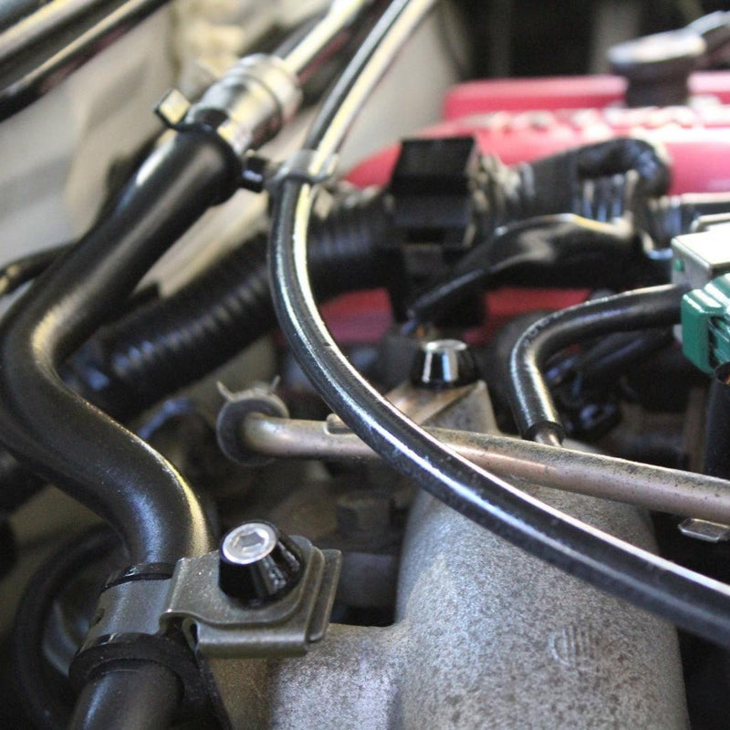 Load image into Gallery viewer, ZSPEC Stage-2 stainless and billet fastener kit installed on a Nissan S14 engine bay with black hardware.