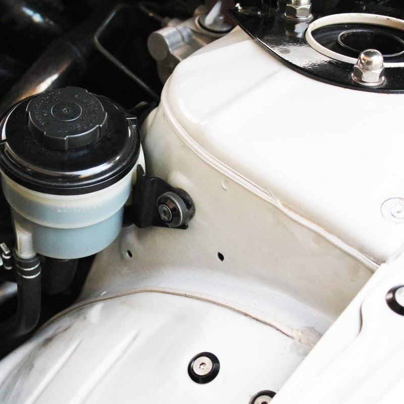 Load image into Gallery viewer, ZSPEC stainless/billet fastener kit on a Nissan 240SX S14 engine bay, featuring black finish bolts.