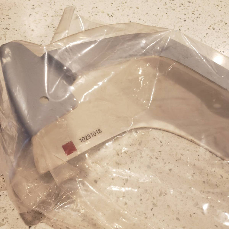 Load image into Gallery viewer, New R34 GTR Nismo S-Tune rear under spoiler, unpainted grey fiberglass, sealed in original plastic packaging.