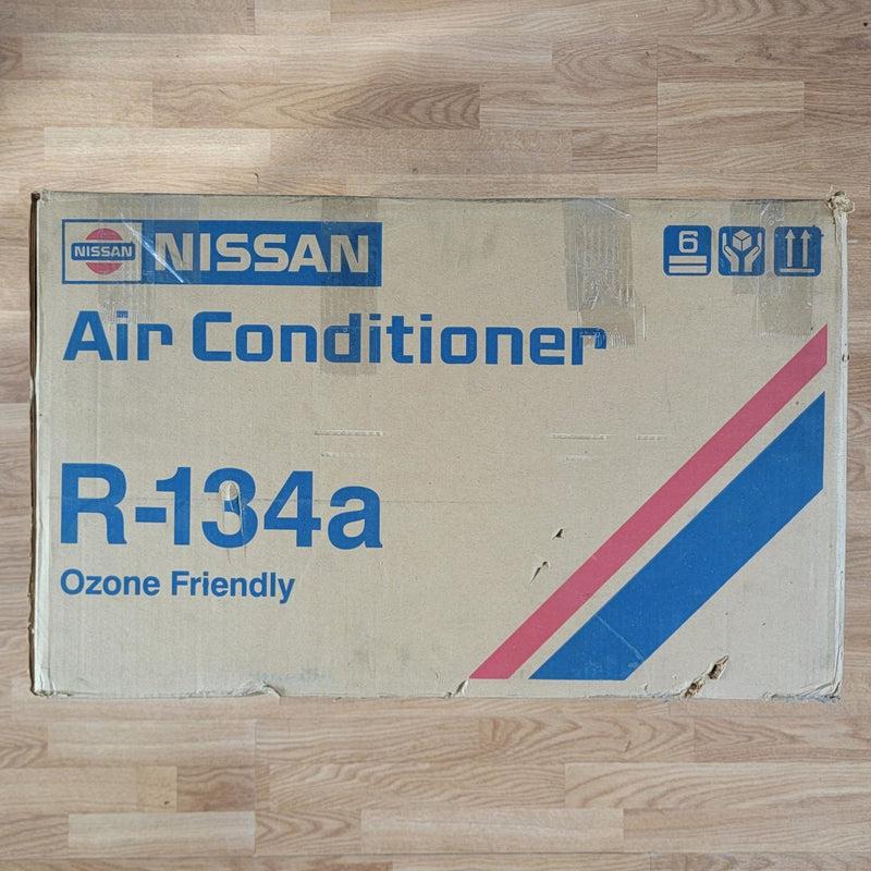 Load image into Gallery viewer, New old stock Nissan S13 240SX R134a AC installation kit in its original branded cardboard box.