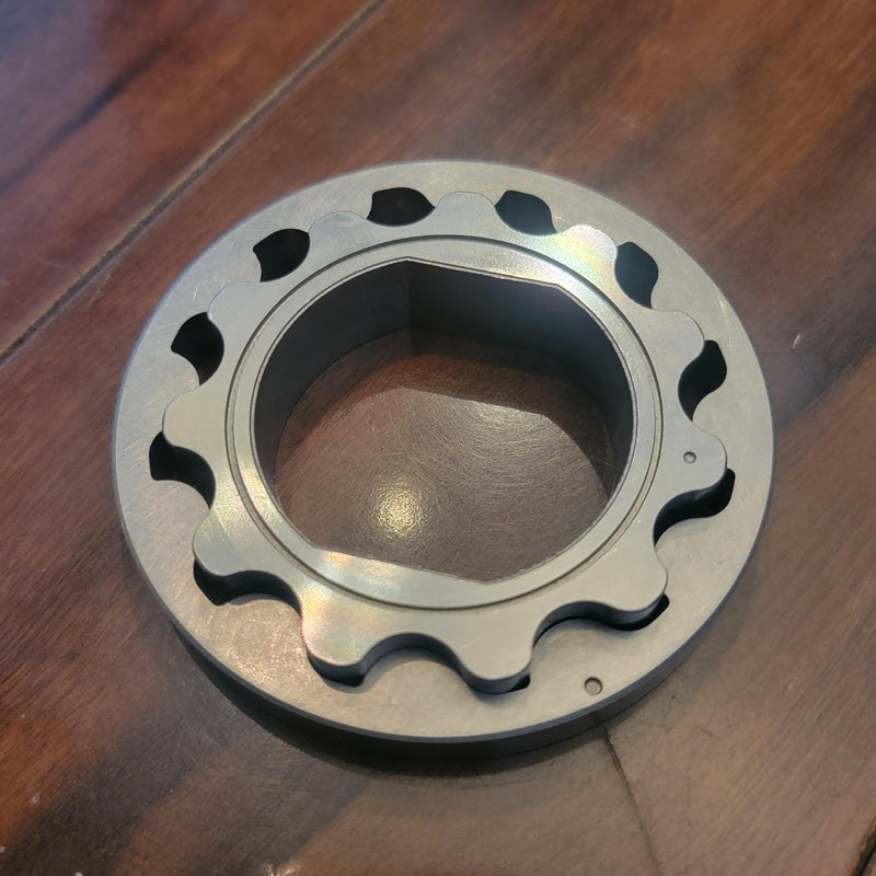 Load image into Gallery viewer, New silver steel oil pump inner rotor for Nissan S13 240SX KA24DE engine, shown on a wooden surface.