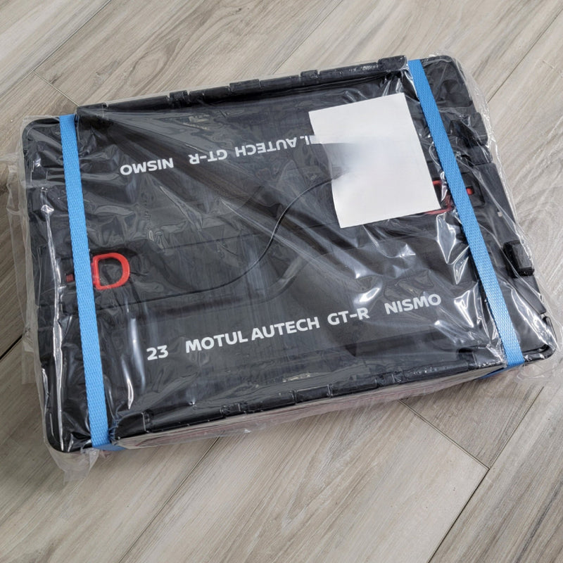 ギャラリービューアに画像をロードする, New black Nismo 20L folding container tote for GT-R, sealed in original plastic packaging with blue straps.