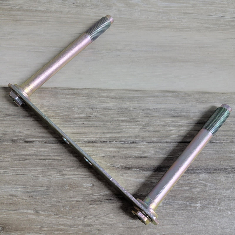 Load image into Gallery viewer, New Nissan RWD front subframe mounting bolt set with gold-zinc finish and connecting plate.