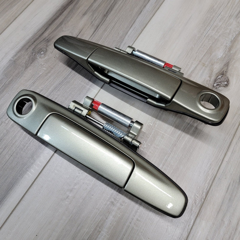 Load image into Gallery viewer, Nissan R34 Skyline Coupe Front Door Handle Set (JW0) - NizmoPartsPlug