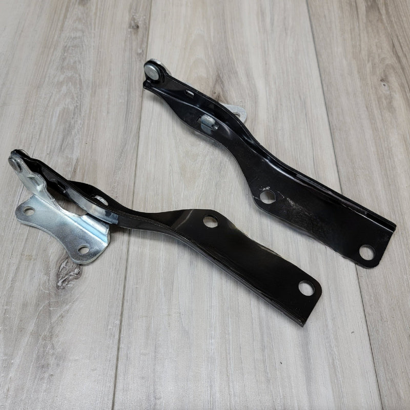 Load image into Gallery viewer, Nissan R34 Skyline GT-R Hood Hinge Bracket Set - NizmoPartsPlug