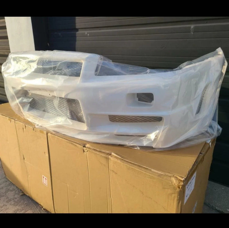 Load image into Gallery viewer, Nissan R34 Skyline GTR Z-Tune Nismo Front Bumper Assembly (Discontinued) - NizmoPartsPlug