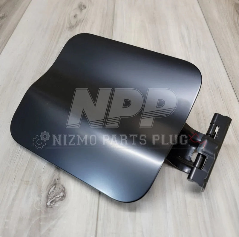 Load image into Gallery viewer, Nissan R34 Skyline GTR Fuel/Gas Door Lid Assembly - NizmoPartsPlug