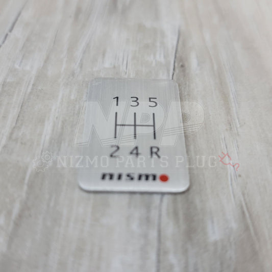 Nismo 5-Speed Manual Shift Pattern Brushed Emblem