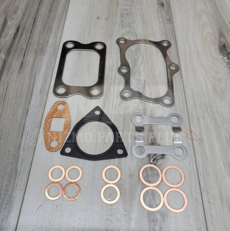 Load image into Gallery viewer, Nissan Skyline RB20DET RB25DET Turbocharger Gasket Kit - NizmoPartsPlug