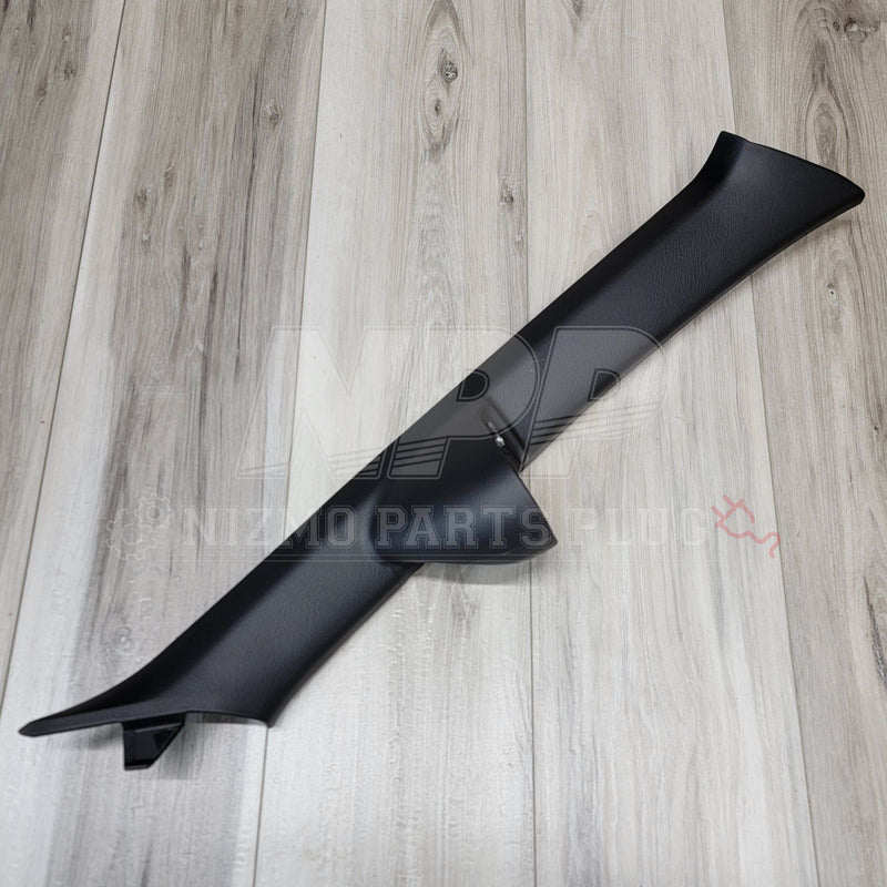 Load image into Gallery viewer, Black Nissan S15 Silvia right-hand A-pillar trim with a built-in boost gauge mount, shown on a wood-grain background.