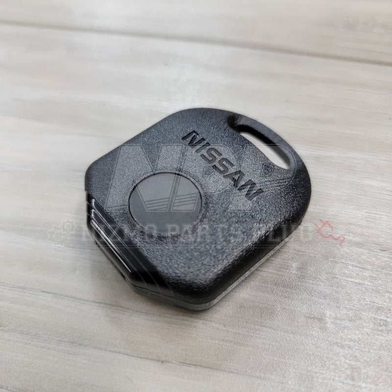 Load image into Gallery viewer, Black Nissan keyless entry remote for R33, 180SX, and S14. Excellent condition with logo and single button.