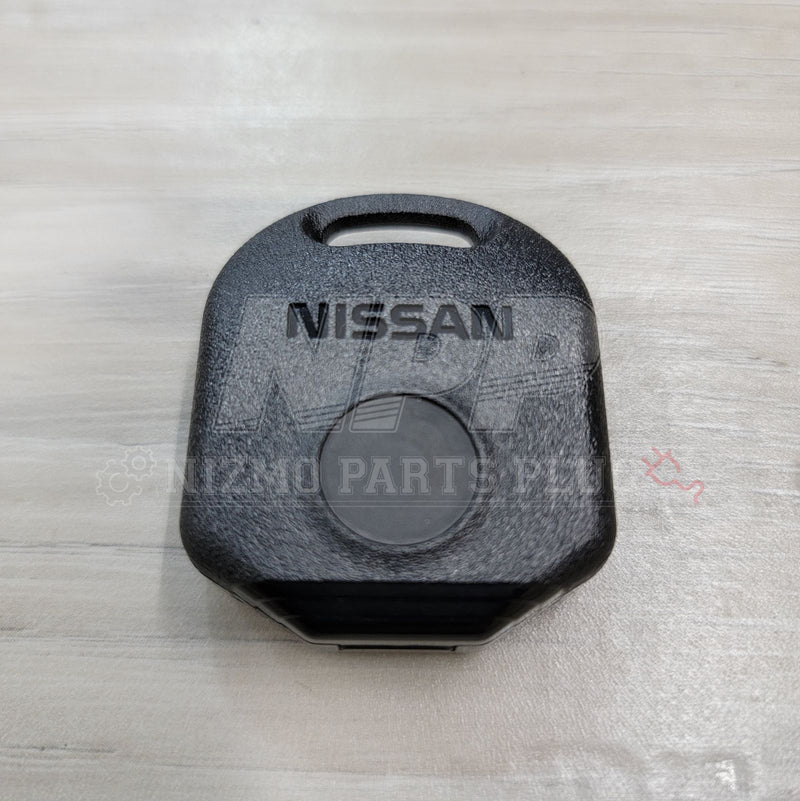 Load image into Gallery viewer, Black Nissan keyless entry remote for R33, RPS13, and S14 models, showing brand logo and button on a light surface.