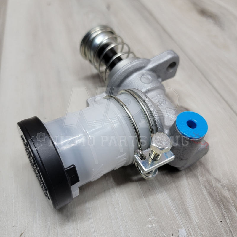 Load image into Gallery viewer, New Nissan R32/R33/R34 Skyline GTR clutch master cylinder with a white reservoir and silver metal body.