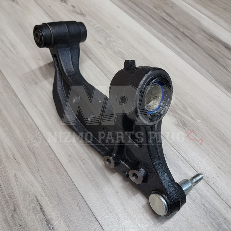 Load image into Gallery viewer, Black Nissan R33/R34 Skyline front knuckle extension arm with integrated bushing and ball joint.