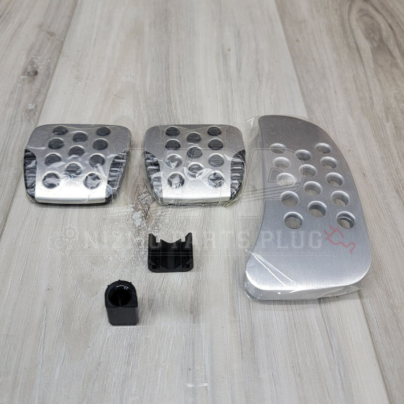 Load image into Gallery viewer, Nissan R34 Skyline GTR V-Spec II Aluminum Pedal Set - NizmoPartsPlug