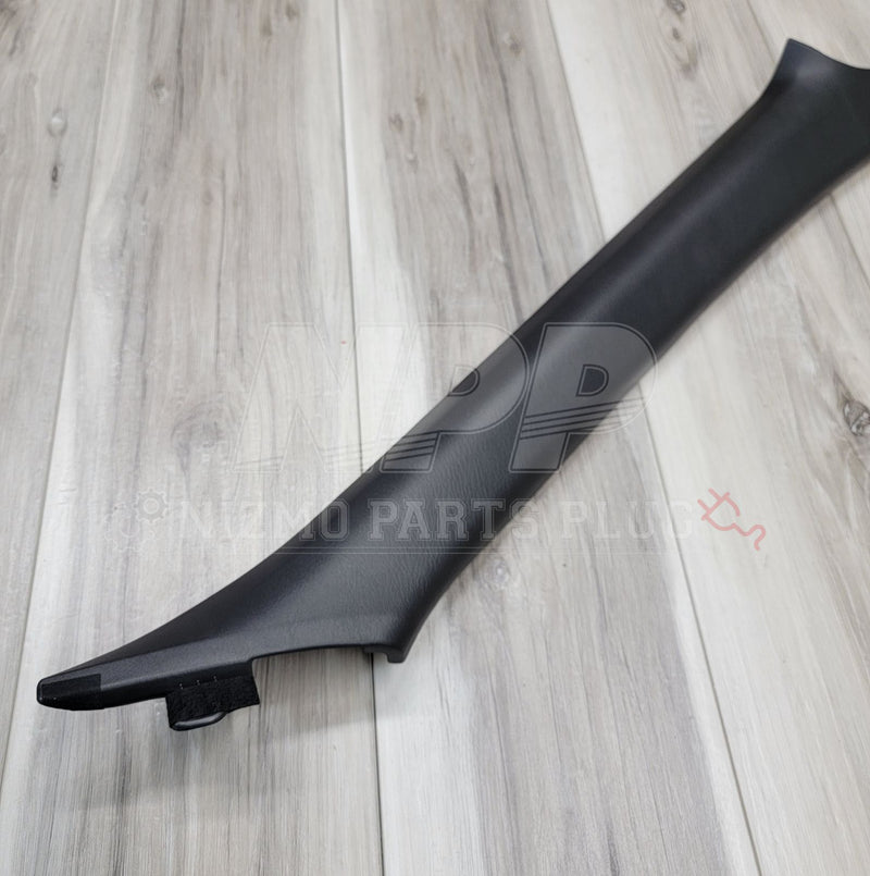 Load image into Gallery viewer, Black RH interior A-pillar trim for Nissan R34 Skyline Coupe. Excellent condition piece on a wood grain background.