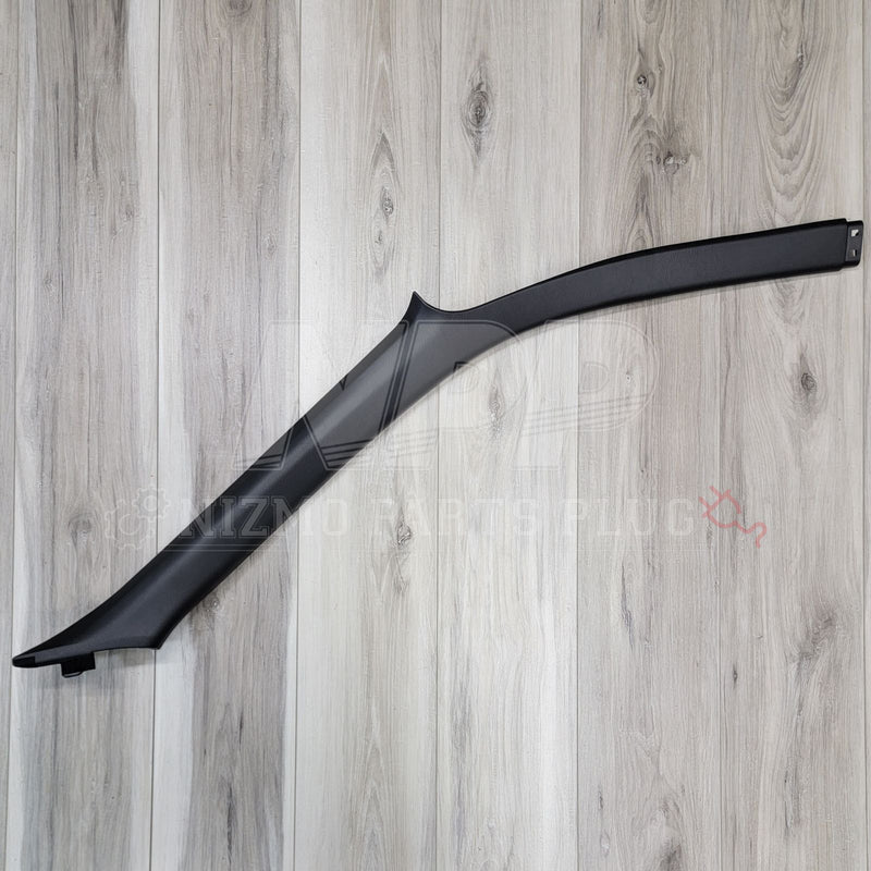 Load image into Gallery viewer, Black right-hand interior A-pillar trim for Nissan R34 Skyline coupe. Excellent condition on a light wood background.