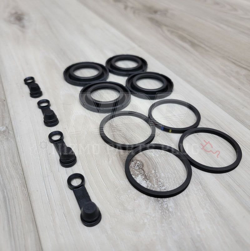Load image into Gallery viewer, Nissan R33/34 GTR Rear Brembo Brake Caliper Seal Kit - NizmoPartsPlug