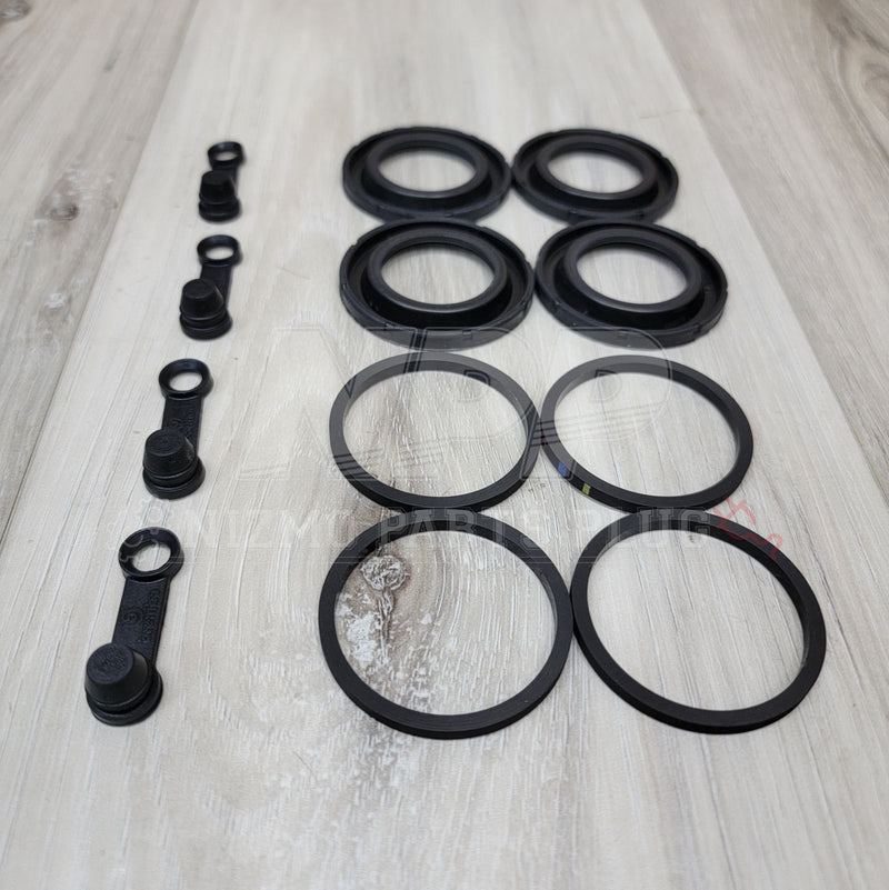 Load image into Gallery viewer, Nissan R33/34 GTR Rear Brembo Brake Caliper Seal Kit - NizmoPartsPlug