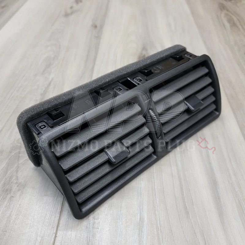 Load image into Gallery viewer, Nissan R32 Skyline Interior Center Ventilator Assembly - NizmoPartsPlug