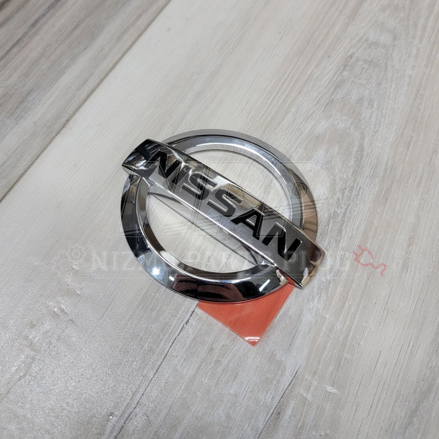 Nissan R34 Skyline GT-R "Nissan" Trunk Emblem (Late) - NizmoPartsPlug