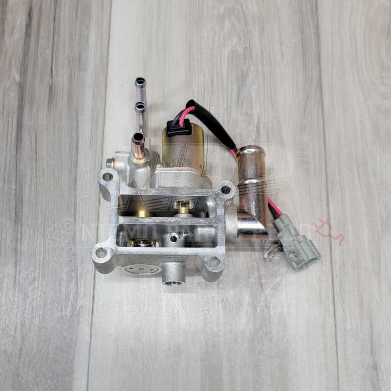 Load image into Gallery viewer, Nissan R34 Skyline RB25DET NEO idle air control valve, silver metal finish with wiring harness and connector.