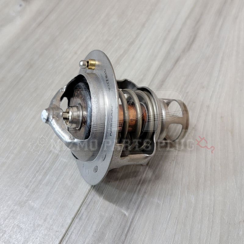 Load image into Gallery viewer, Nissan R34 Skyline RB25DET NEO Thermostat Assembly - NizmoPartsPlug