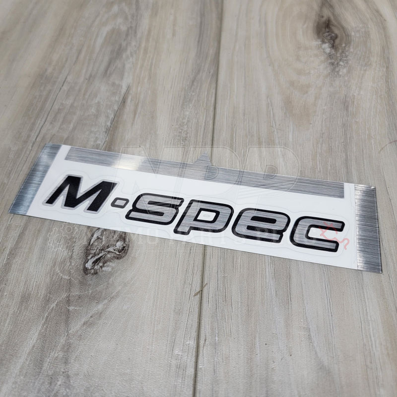 Load image into Gallery viewer, Nissan R34 Skyline GT-R M-Spec Emblem Trunk Decal - NizmoPartsPlug