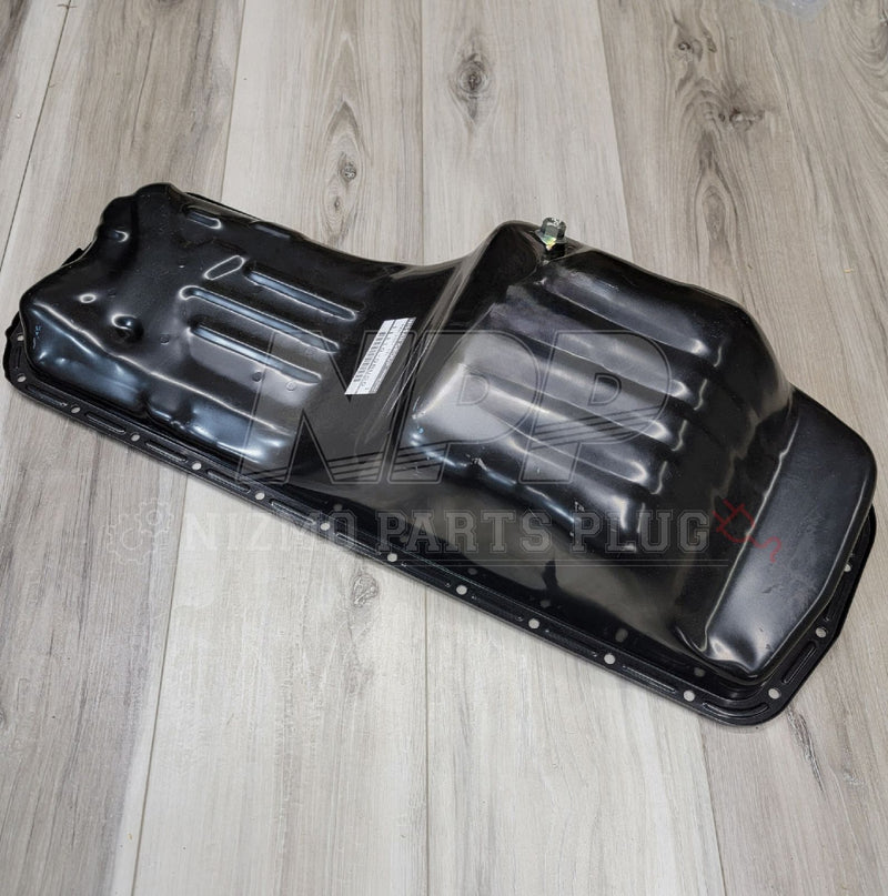 Load image into Gallery viewer, Black RB20/RB25DET RWD oil pan assembly for Nissan Skyline, new condition, angled top-down view.