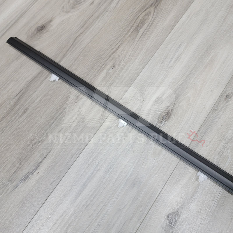 Load image into Gallery viewer, Nissan R34 Skyline Sedan Rear LH Outer Door Molding - NizmoPartsPlug