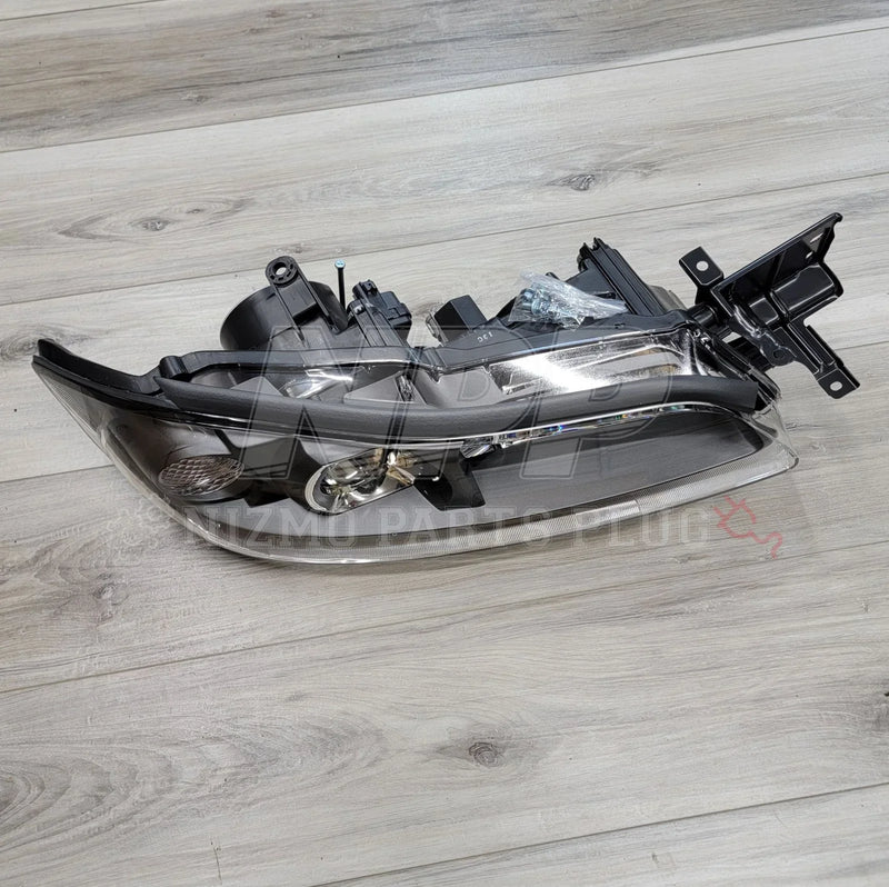 Load image into Gallery viewer, Nissan S15 Silvia HID RH Projector Headlight Assembly side view on wooden floor.
