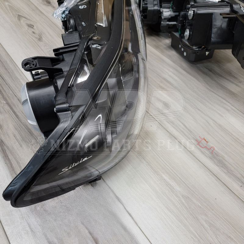 Load image into Gallery viewer, OEM black housing HID headlight assembly for Nissan S15 Silvia, excellent condition, with clear lenses.