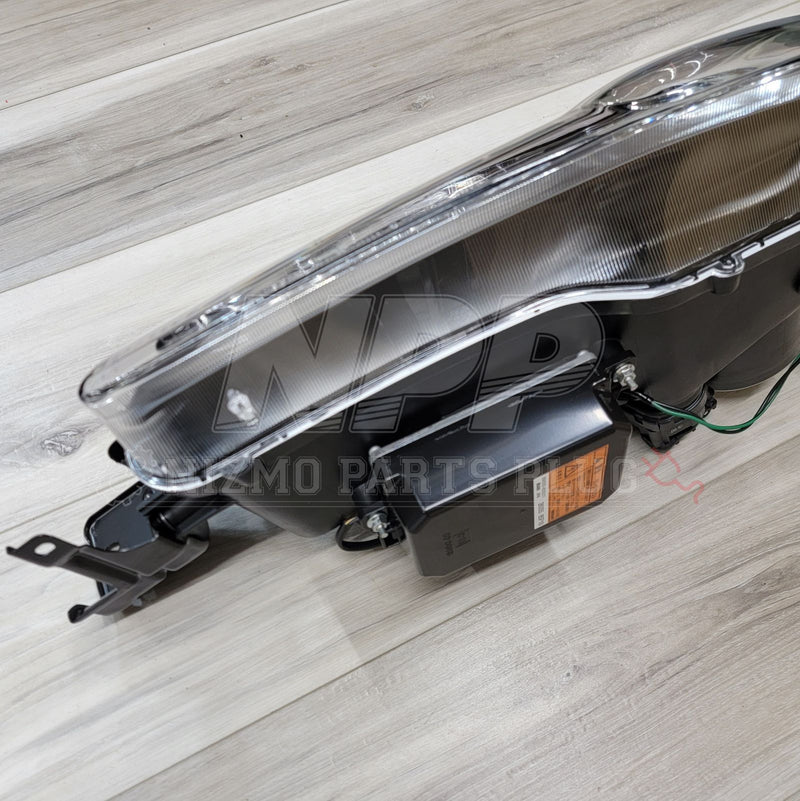 Load image into Gallery viewer, OEM Nissan S15 Silvia HID headlight assembly. Clean condition with black housing and clear lens.