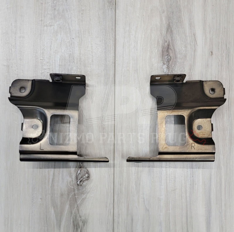 Load image into Gallery viewer, Nissan R34 Skyline GTR Headlight Bracket Set - NizmoPartsPlug