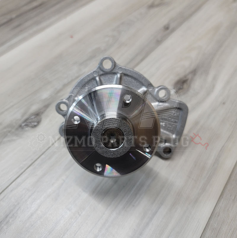 Load image into Gallery viewer, Nissan S13 Silvia SR20DET OEM Water Pump Assembly - NizmoPartsPlug