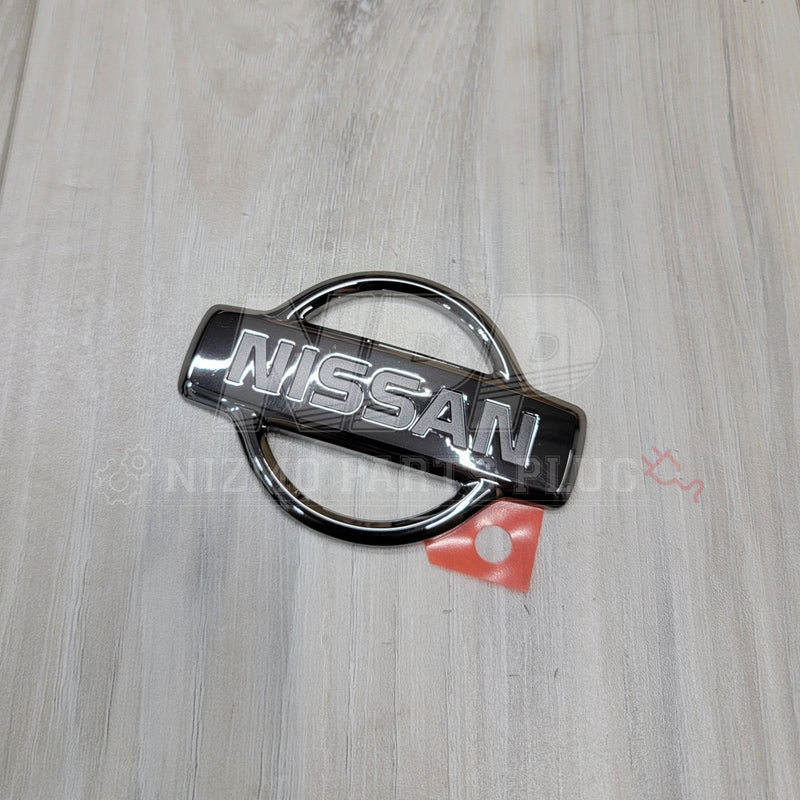 Load image into Gallery viewer, Nissan R34 Skyline GT-R Early Trunk Logo Emblem - NizmoPartsPlug